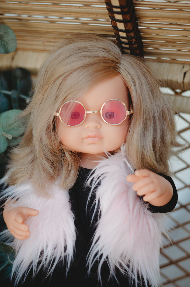 Smart doll with sunglasses and yellow knitted cap, children's toy from the  GDR of the 1970s, concept of childlike play and human expression Stock  Photo - Alamy